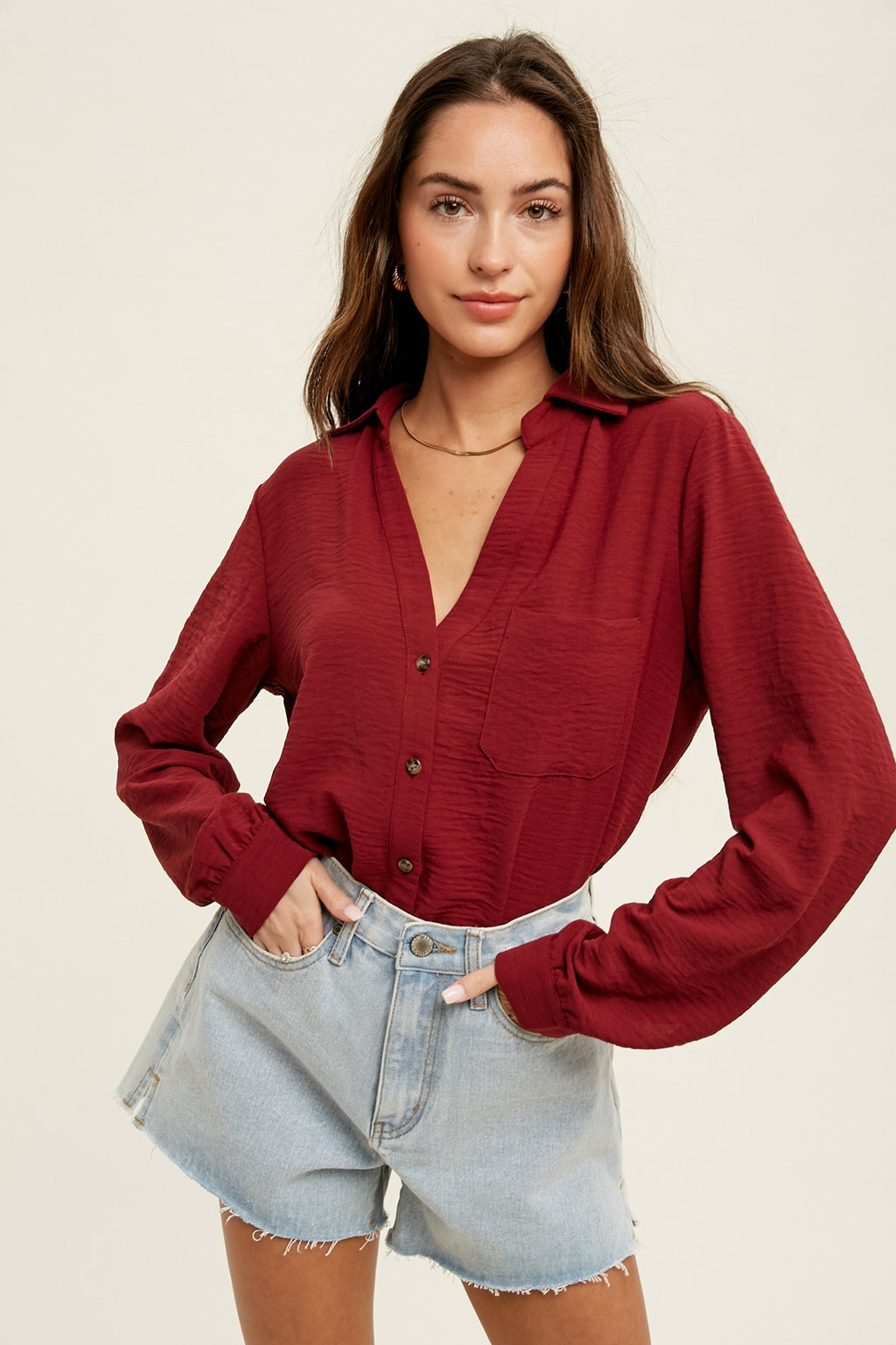 Peyton button up bodysuit with front pocket